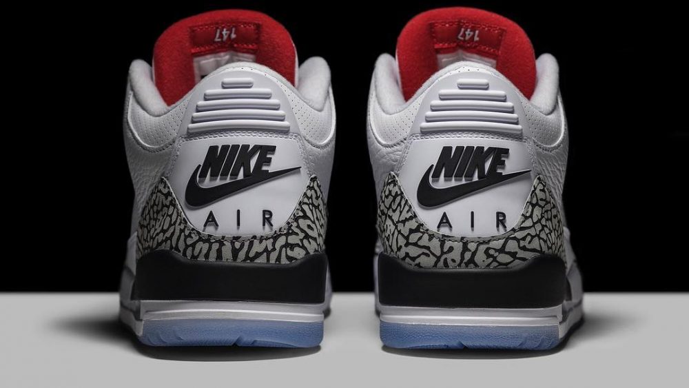 The Air Jordan 3 ‘Free Throw Line’ comes with a translucent sole that has a red …